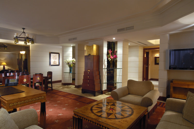 Luxurious Presidential Suite featuring living and dining areas