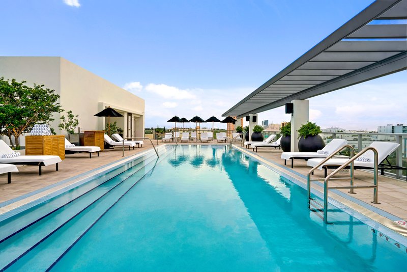 Swimming Pool and Chaise Lounges