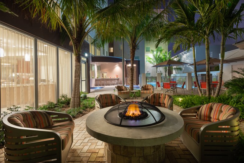 Unwind by the outdoor fire pit with a beer or glass of wine.