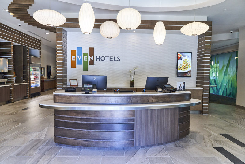 Our welcoming front desk at the EVEN Miami Airport hotel