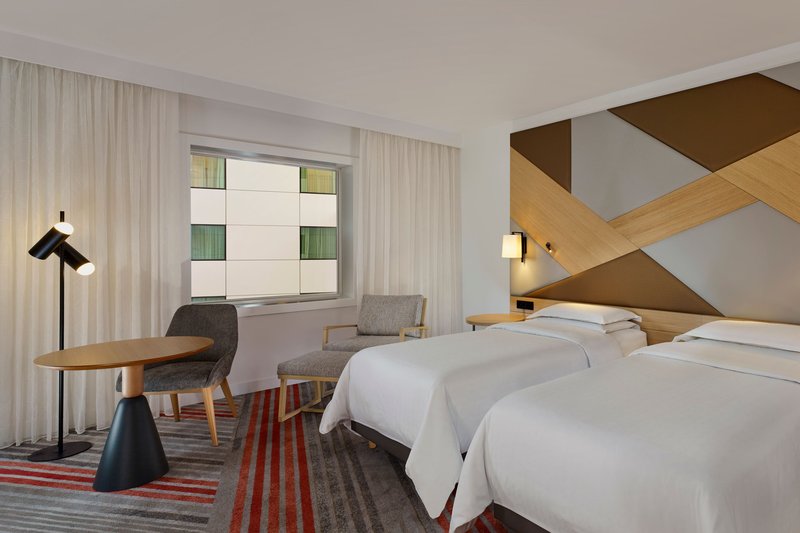 Renovated Sheraton Twin Guestroom with Atrium View