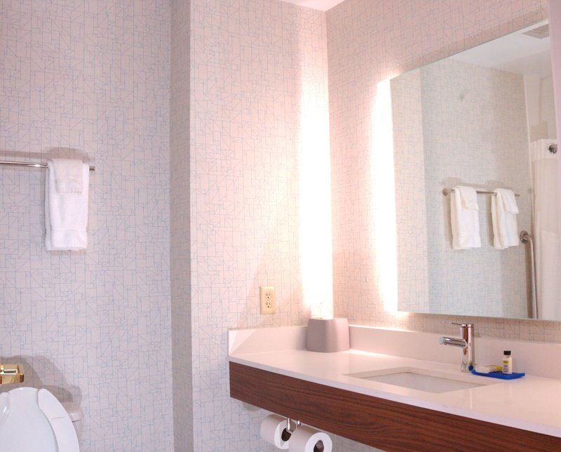 Well lit spacious guest bathroom